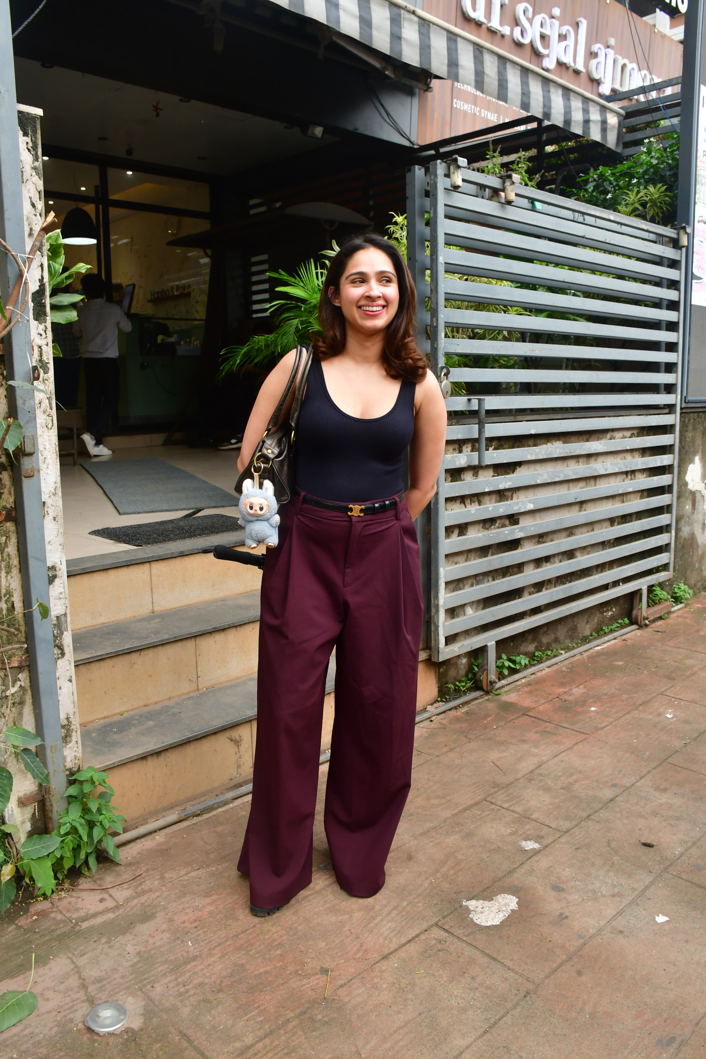 Pashmina Roshan was spotted by the paps in Juhu. She looked casual yet chic in a black tank top paired with maroon wide legged pants.